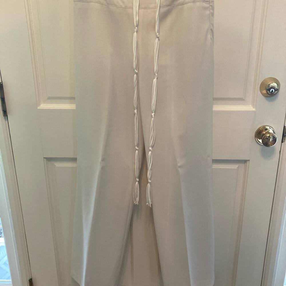 Cream colored lined slacks with rope belt